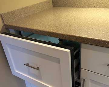 white cabinets with granite countertops